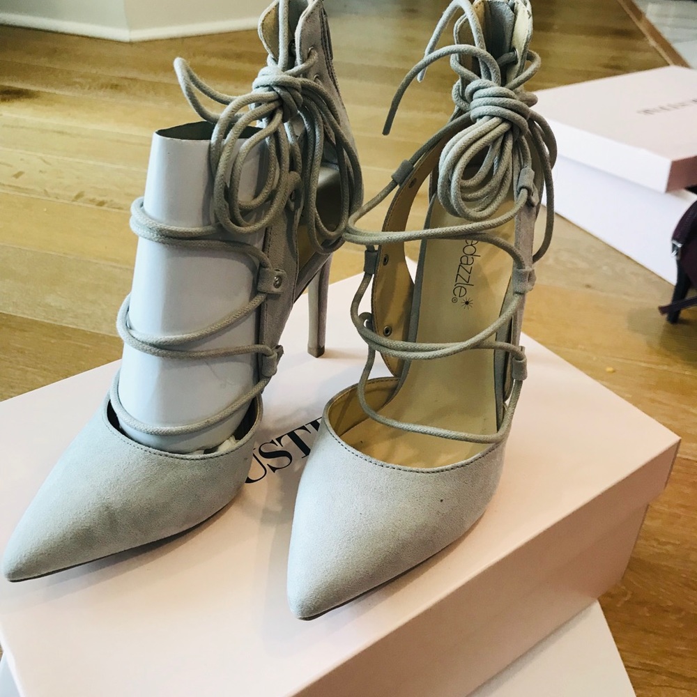 New in box never worn tie up heels in grey.